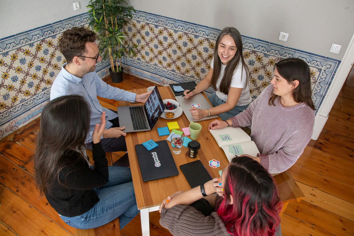 Professionals collaborating in a modern workspace